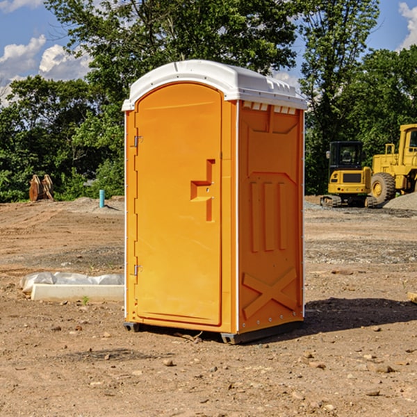 how often are the portable restrooms cleaned and serviced during a rental period in Denham MN